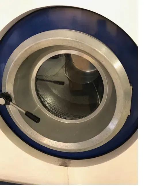 Dry cleaning machine at Frankie's Cleaners